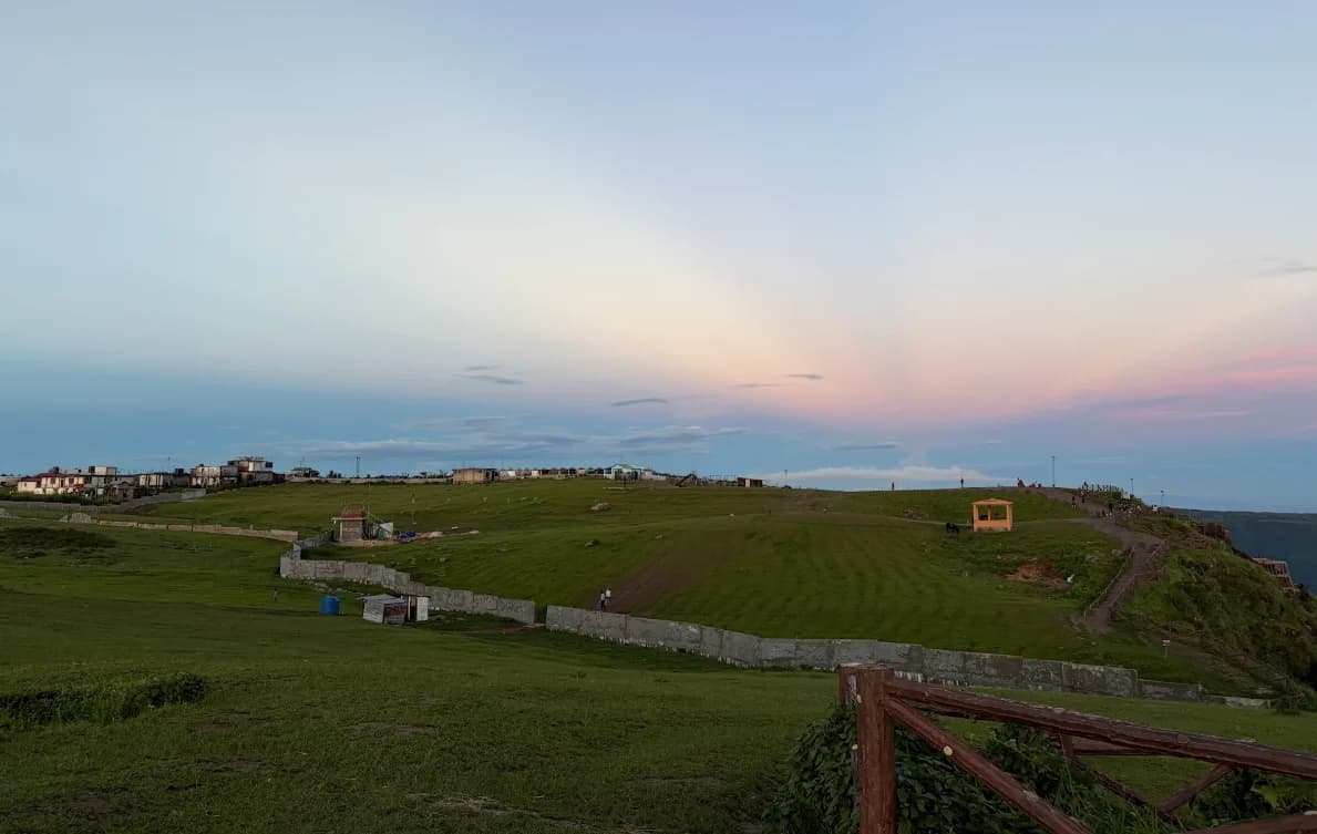 Pink evening sky over the meadow